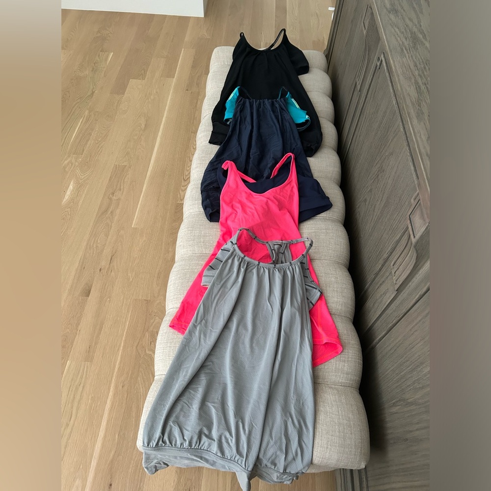 LULULEMON set of 4: like new workout tops with built in bra